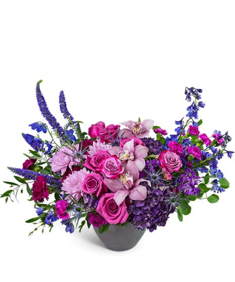 Lavender Eclipse luxury violet centerpiece with roses, orchids, and hydrangea in granite vase – Peoria IL upscale flowers